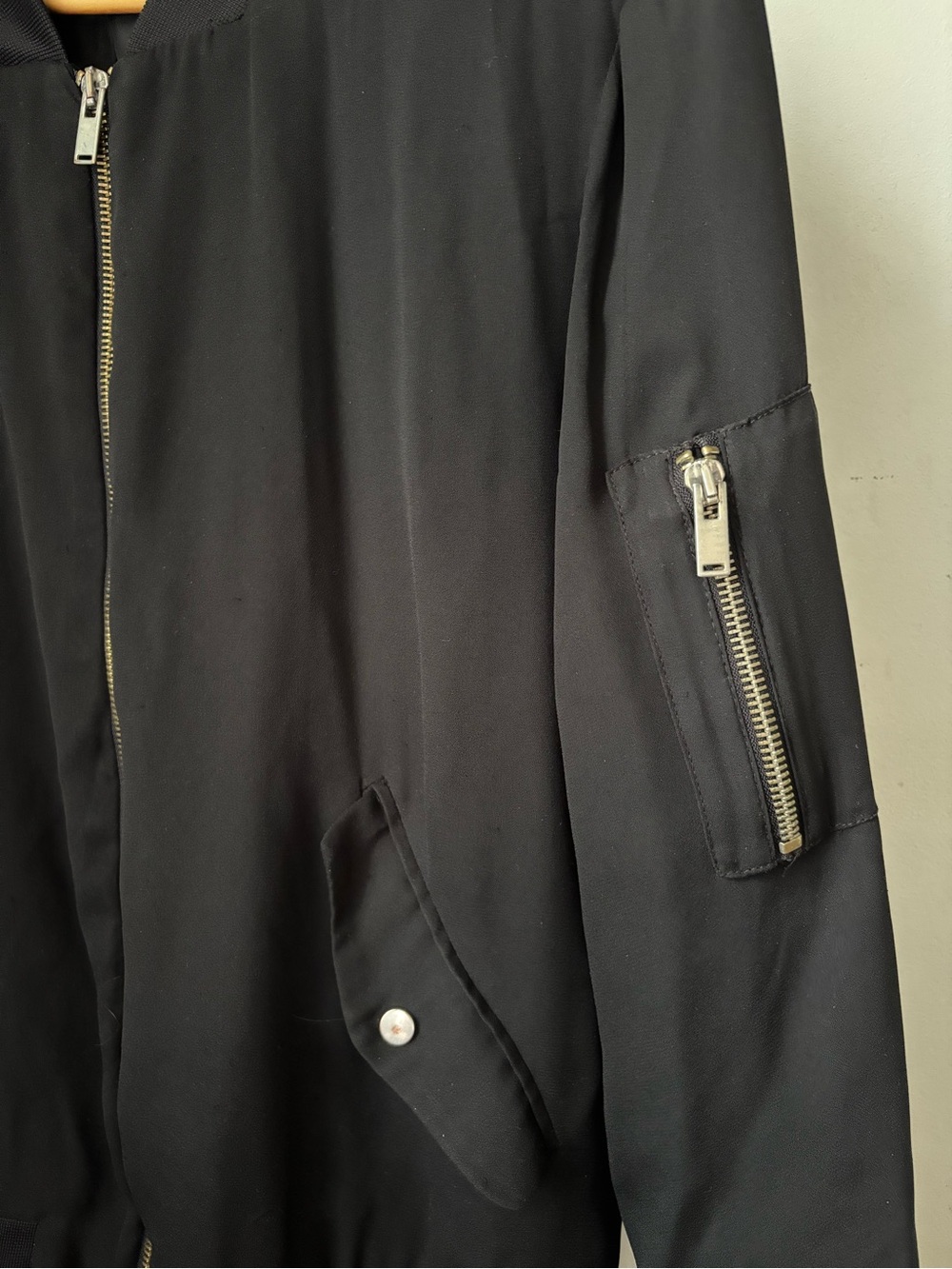 Woman’s light Black Bomber Jacket with Zip Pocket